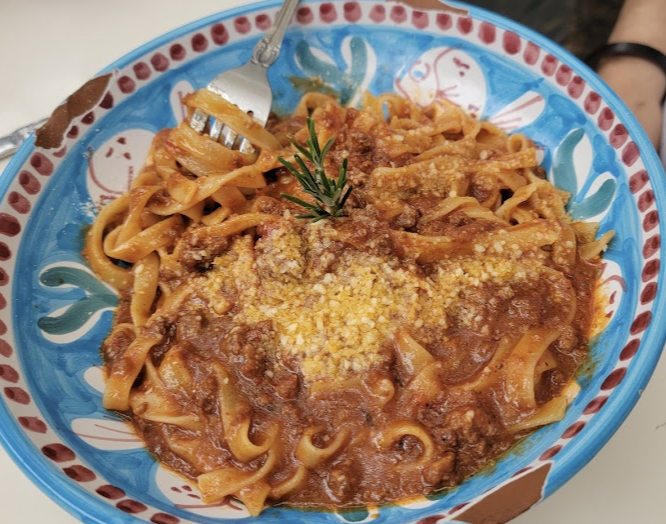 Cesarina signature dishes BologneseLasagna Alla BologneseFunghi